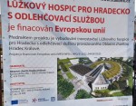 110  Info o stavbě naproti soše...