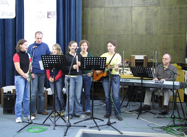 12  Schola